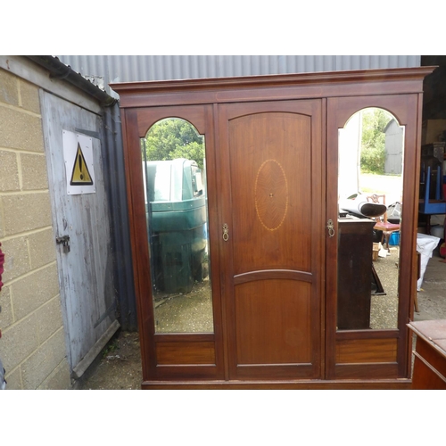 343 - A large Edwardian mahogany triple wardrobe with inlay and fitted interior