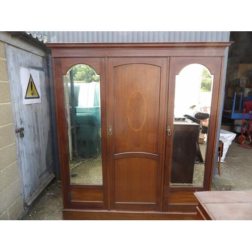 343 - A large Edwardian mahogany triple wardrobe with inlay and fitted interior