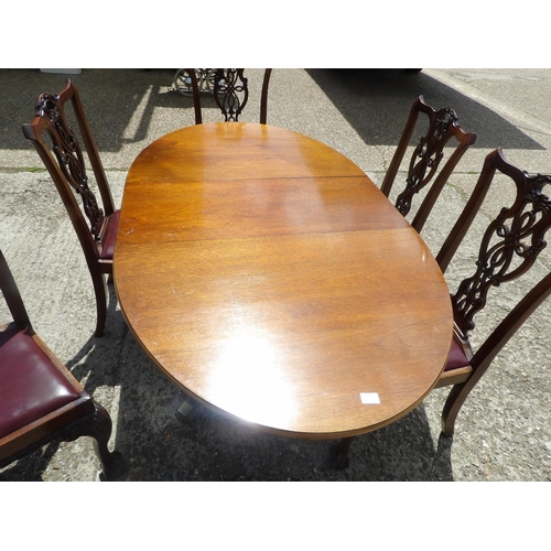 349 - A reproduction mahogany dining table together with mahogany chairs with drop in leather upholstered ... 