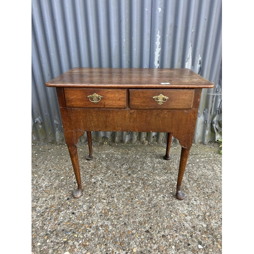 35 - An antique oak two drawer lowboy 77x50x70