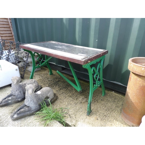 377 - An iron framed garden table for repair