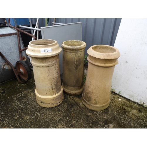 383 - Three chimney pots 65cm tall