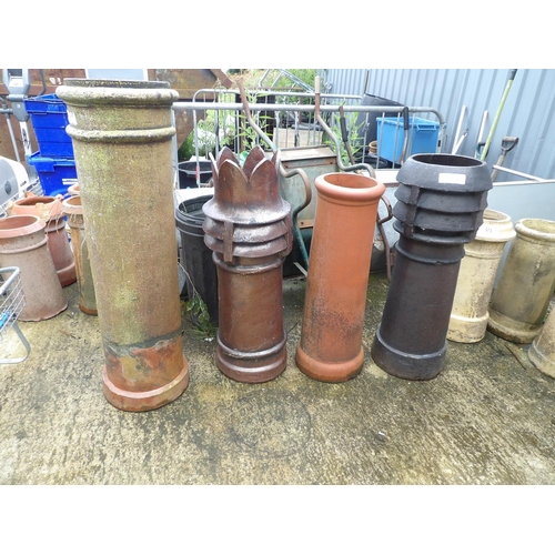 384 - Four large chimney pots