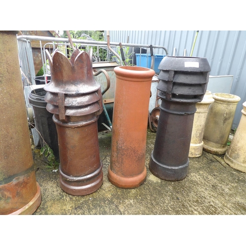 384 - Four large chimney pots