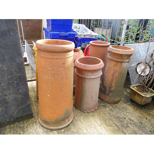 385 - Six terracotta chimney pots