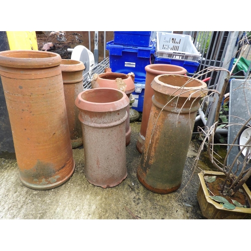 385 - Six terracotta chimney pots