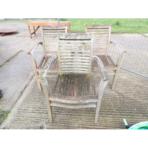 387 - Three hardwood garden chairs