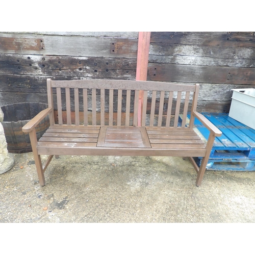 391 - A wooden garden bench with lift up central drinks table. 164 cm long x 63 cms deep x 95 cms high