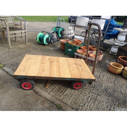 398 - A iron framed hand cart barrow with slated wooden deck