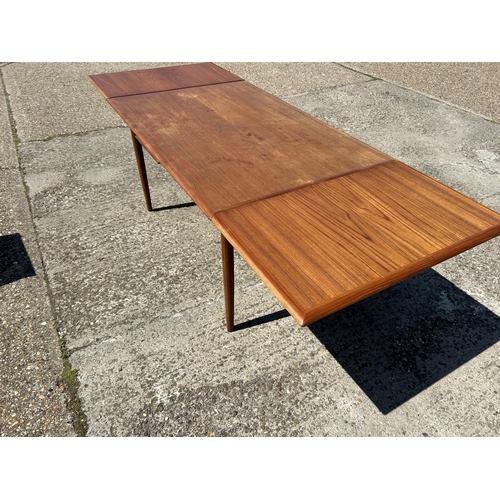 4 - A danish teak drawer leaf dining table MARKED ACO MOBLER by AXEL CHRISTENSEN 138x93x75 (closed)