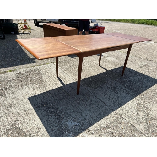 4 - A danish teak drawer leaf dining table MARKED ACO MOBLER by AXEL CHRISTENSEN 138x93x75 (closed)