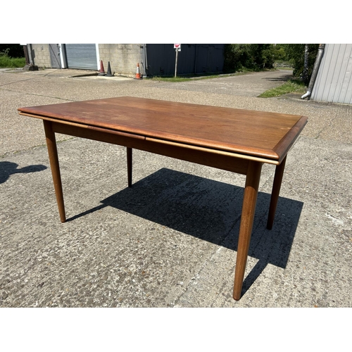 4 - A danish teak drawer leaf dining table MARKED ACO MOBLER by AXEL CHRISTENSEN 138x93x75 (closed)