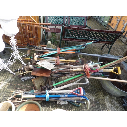 400 - Four large bundles of garden tools