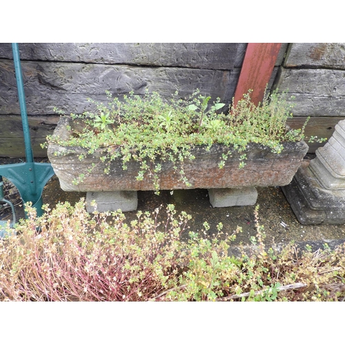 410g - A pair of long rectangular garden troughs on plinth seet