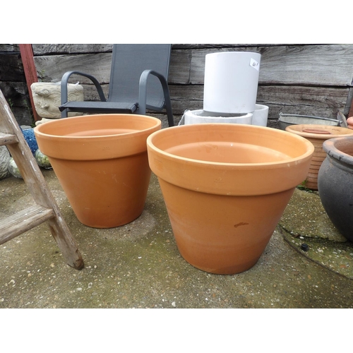 410p - A pair of very large terracotta garden urns