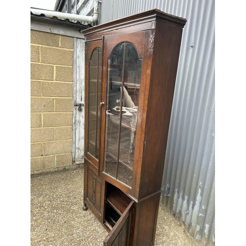 48 - A early 20th century glazed oak bookcase 92x27x125