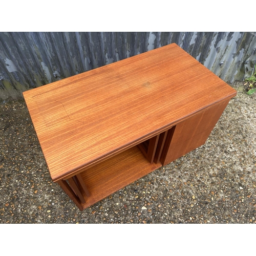 65 - A Macintosh TRISTOR teak fold over nest of three tables