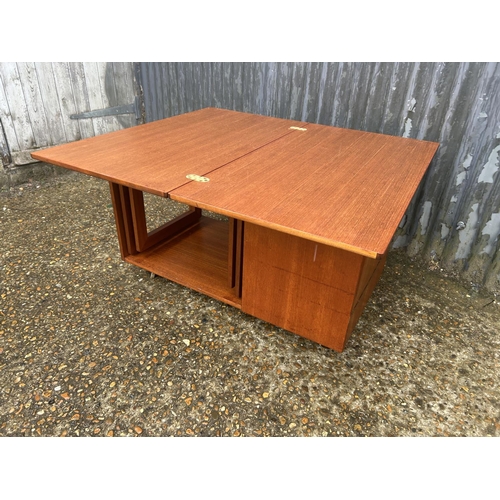 65 - A Macintosh TRISTOR teak fold over nest of three tables