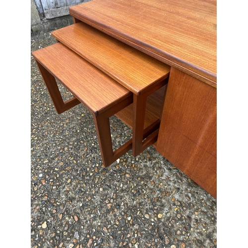 65 - A Macintosh TRISTOR teak fold over nest of three tables