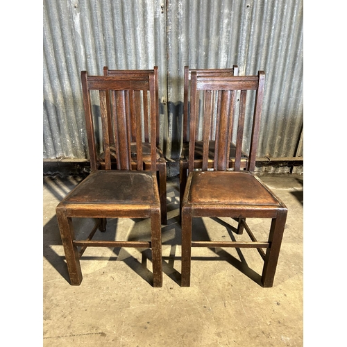 73 - A set of four 1920's oak dining chairs