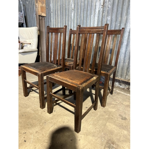 73 - A set of four 1920's oak dining chairs