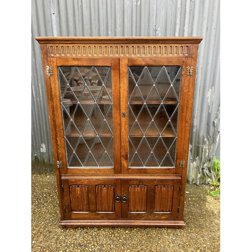 81 - A old charm leaded oak bookcase 97x30x140