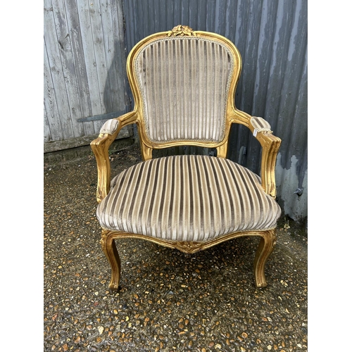 83 - A gold gilt framed throne style chair