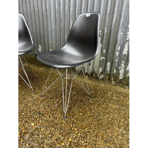 84 - A pair of black and chrome chairs by VITRA