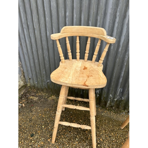 85 - A pair of pine bar stools