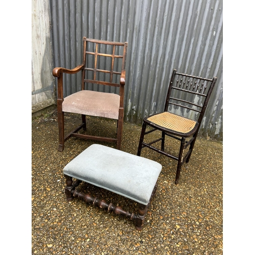 89 - An oak carver chair, oak framed footstool and another chair