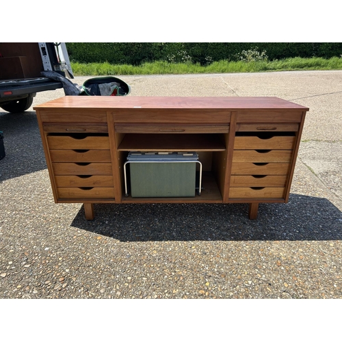 9 - A mid century teak triple tambour sideboard  137x45x70