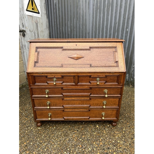 91 - A large solid oak bureau 107x 46  x5