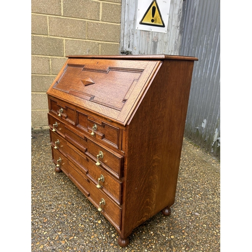 91 - A large solid oak bureau 107x 46  x5