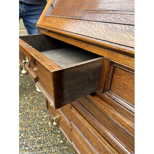 91 - A large solid oak bureau 107x 46  x5