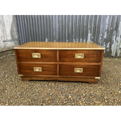 92 - A military style reprodux leather top four drawer coffee table chest 97x 42x40