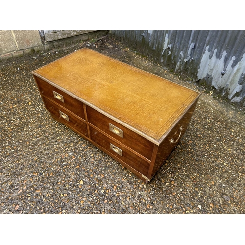 92 - A military style reprodux leather top four drawer coffee table chest 97x 42x40