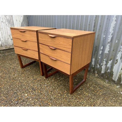 96 - A pair of retro teak effect chests of three drawers