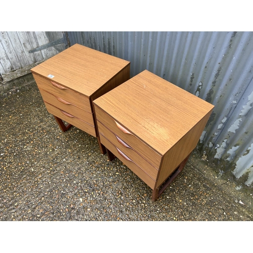 96 - A pair of retro teak effect chests of three drawers