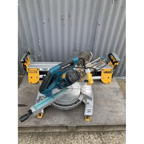 419 - Makita 110v Mitre saw LS1018L with Dewalt DE7024-XJ type 3 folding stand (2), Working