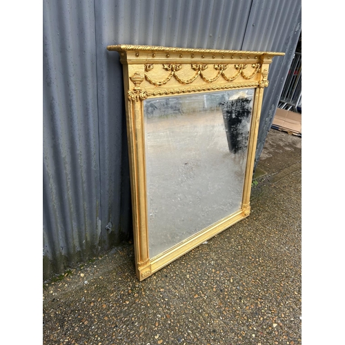 42 - A large regal gold gilt framed overmantel mirror 128 x 133