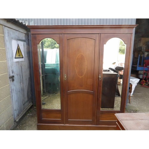58 - A large Edwardian mahogany triple wardrobe with inlay and fitted interior