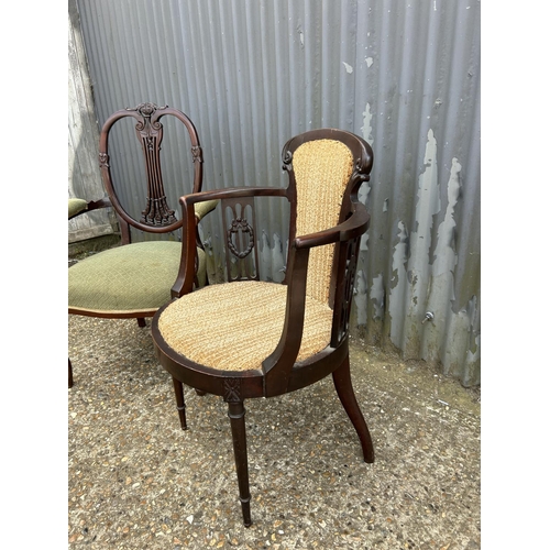 104 - Two mahogany carver chairs