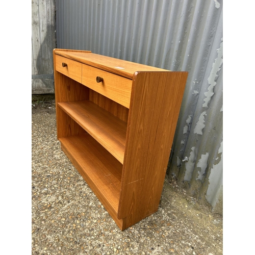 123 - A teak Nathan bookcase with drawer