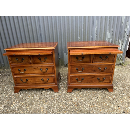 128 - A pair of small yew bachelors chests of drawers  60x45x60