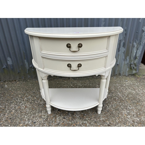129 - A painted Demi lune hall table with drawer 84x40x80