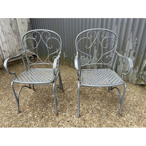 133 - A pair of vintage iron folding chairs for restoration