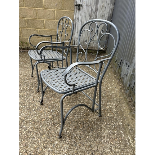 133 - A pair of vintage iron folding chairs for restoration