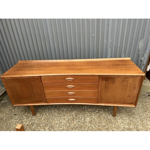 135 - A mid century teak sideboard 183x53x80