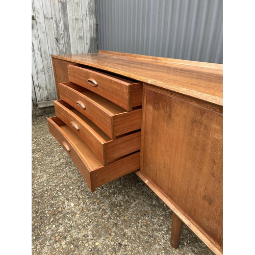 135 - A mid century teak sideboard 183x53x80