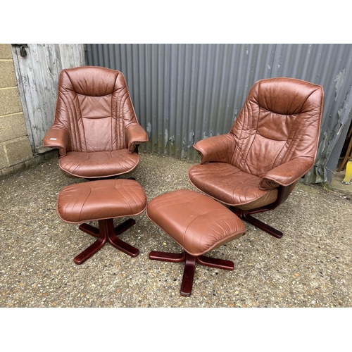 167 - A pair of Norwegian style soft brown leather easy chais with stools labelled SOMO